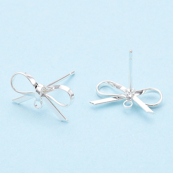 

PandaHall Brass Stud Earring Findings, with Loop, Bowknot, Nickel Free, Silver, 8~10x15mm, Hole: 1.2mm, Pin: 0.7mm. Brass Bowknot