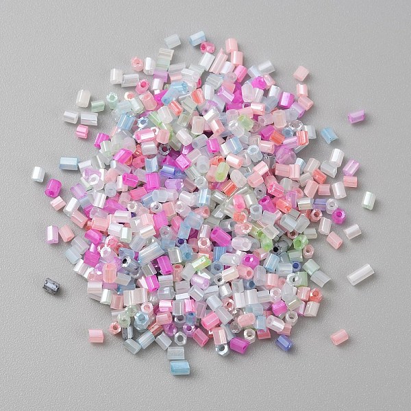 

PandaHall Opaque Colours Glass Hexagon Bugle Beads, Round Hole, Pearl Pink, 1.5~2.5x2mm, Hole: 0.9mm, 5500pcs/100g Glass