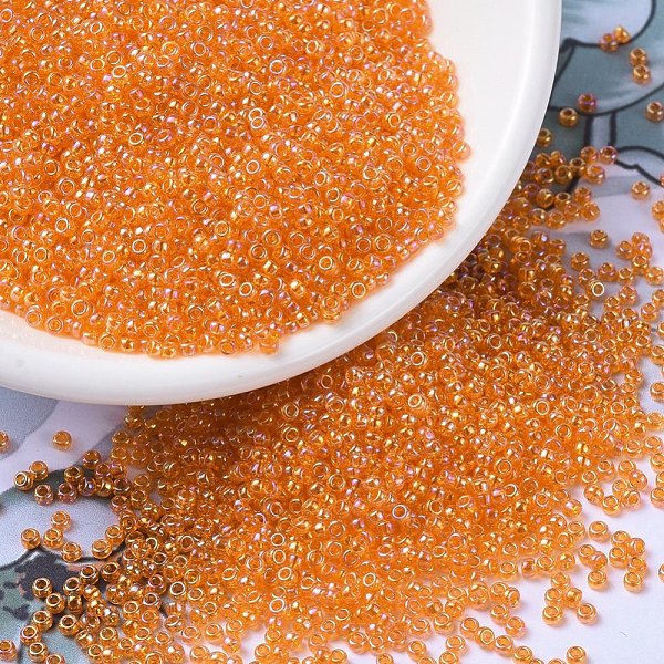 

PandaHall MIYUKI Round Rocailles Beads, Japanese Seed Beads, 11/0, (RR253) Transparent Orange AB, 2x1.3mm, Hole: 0.8mm, about 50000pcs/pound...