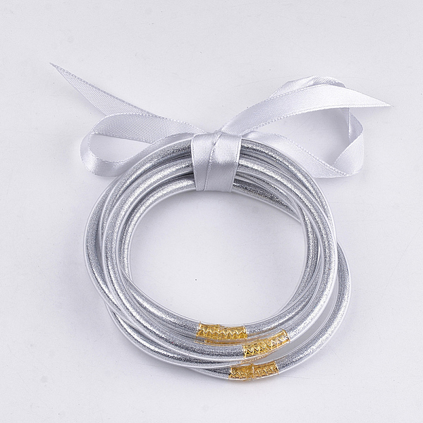 

PandaHall PVC Plastic Buddhist Bangle Sets, Jelly Bangles, with Glitter Powder and Polyester Ribbon, Light Grey, 2-1/2 inch(6.3cm), 5pcs/set..., Gray