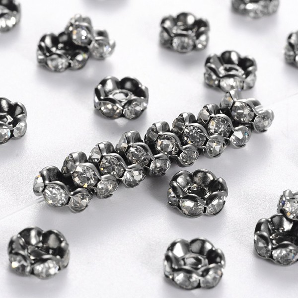 

PandaHall Brass Rhinestone Spacer Beads, Grade A, Wavy Edge, Gunmetal, Rondelle, Crystal, 6x3mm, Hole: 1mm Brass+Rhinestone Rondelle Clear