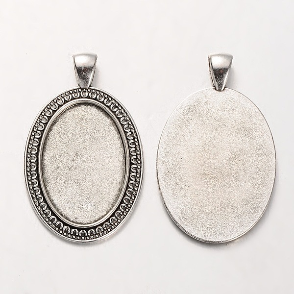 

PandaHall Tibetan Style Alloy Oval Pendant Cabochon Settings, Cadmium Free & Lead Free, Antique Silver, 47x29x2mm, Hole: 5x7mm, Tray...