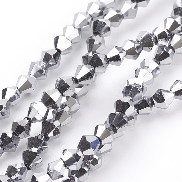 

PandaHall Electroplate Glass Beads Strands, Faceted, Bicone, Silver, 4x4mm, Hole: 1mm, about 92~96pcs/strand, 13.78~14.37 inch. Glass Bicone...