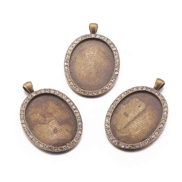 

PandaHall Oval Tibetan Style Alloy Big Pendant Cabochon Settings, with Rhinestones, Nickel Free, Antique Bronze, Tray: 40x30mm, 56x35x3mm..., Clear