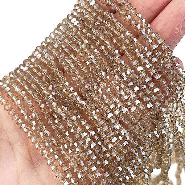 

PandaHall Transparent Electroplate Glass Beads Strands, Pearl Luster Plated, Faceted, Bicone, PeachPuff, 3.2x2.8mm, Hole: 0.7mm, about..., Brown