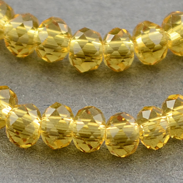 

PandaHall Transparent Glass Beads Strands, Faceted, Rondelle, Goldenrod, 3x2mm, Hole: 0.5mm, about 160~165pcs/strand, 15.35 inch~15.75 inch..., Gold
