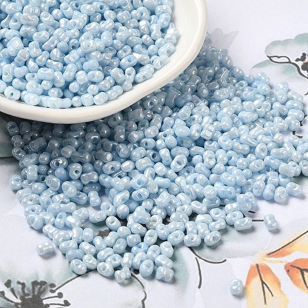 

PandaHall Glass Seed Beads, Peanut, Cyan, 3.5~4x2~2.5x2~2.3mm, Hole: 0.8mm, about 8000pcs/pound Glass Peanut Cyan