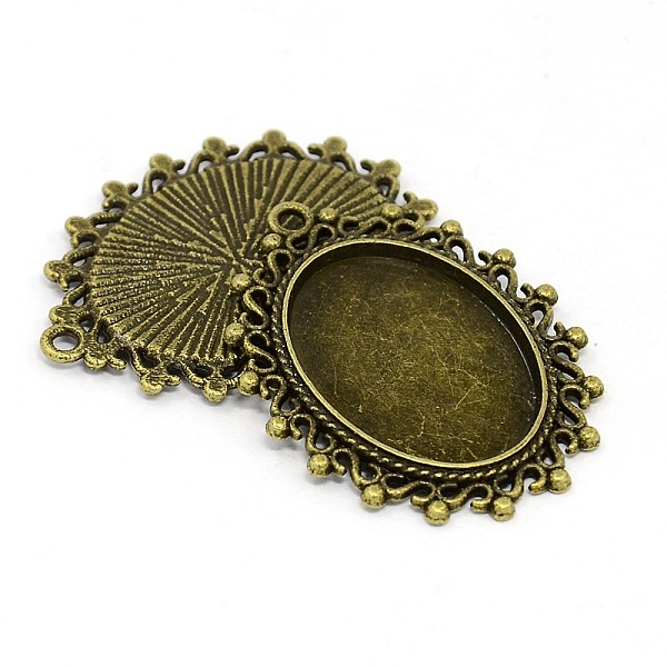 

PandaHall Nickel Free Tibetan Style Alloy Oval Pendant Cabochon Settings, Antique Bronze, Tray: 18x25mm, 38x30x2mm, Hole: 2mm Alloy Oval